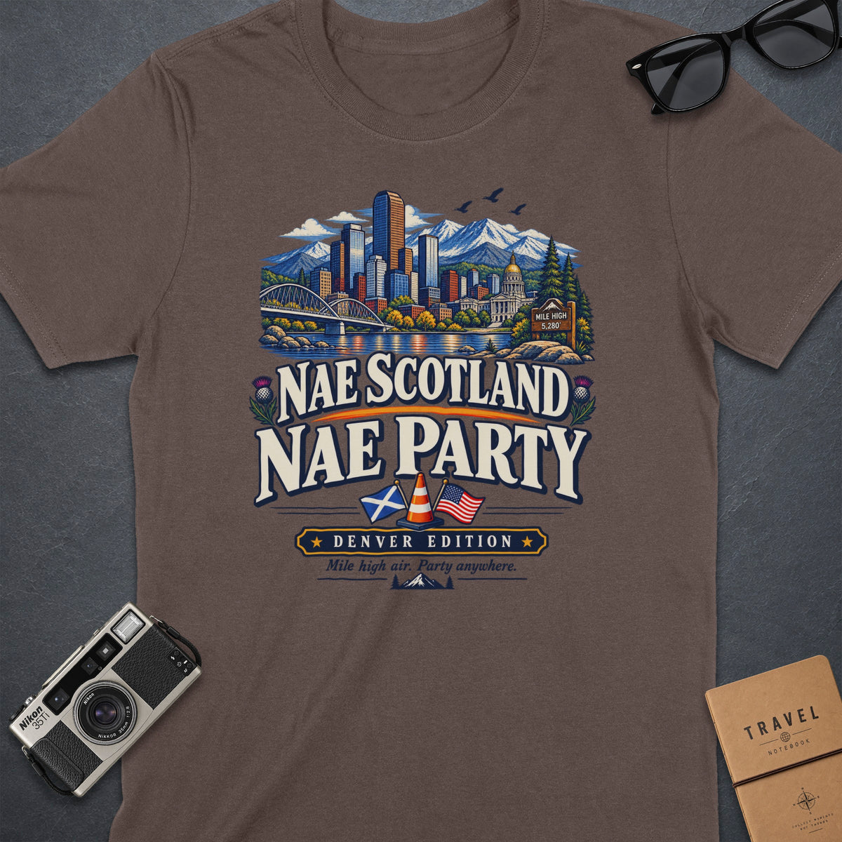 Brown t-shirt with "Nae Scotland Nae Party" and Denver skyline graphics.