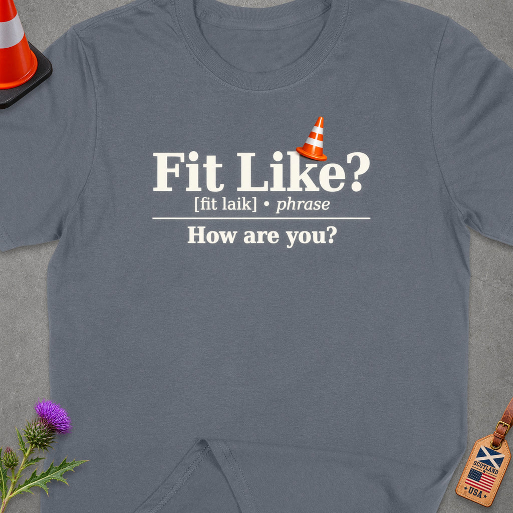 T-shirt with "Fit Like? [fit laik] • phrase How are you?" text.