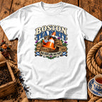 A white t-shirt featuring a graphic with a traffic cone in sunglasses holding a teacup amidst stacked tea crates, with text reading Boston Tea Party and Nae Scotland, Nae Party.
