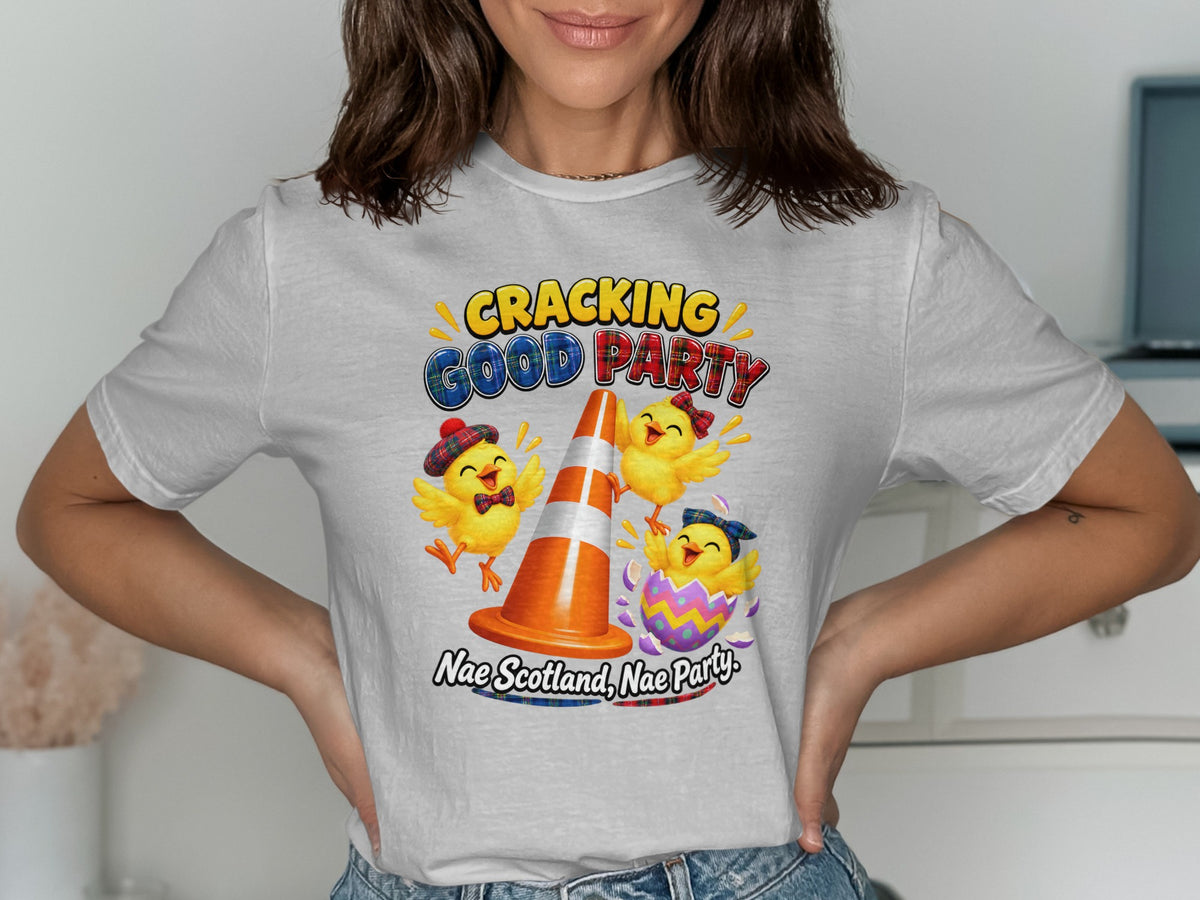 Three chicks celebrate around a traffic cone, with text "Cracking Good Party".