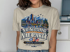 T-shirt with Denver skyline, mountains, Scottish and US flags, and text.