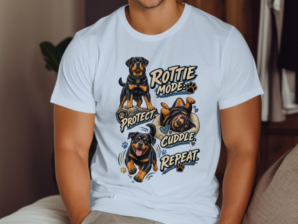 White t-shirt graphic with three Rottweilers and text: Rottie Mode, Protect, Cuddle, Repeat.