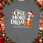 Grey t-shirt with "One More Dram" text, a whiskey glass, and Christmas decorations.