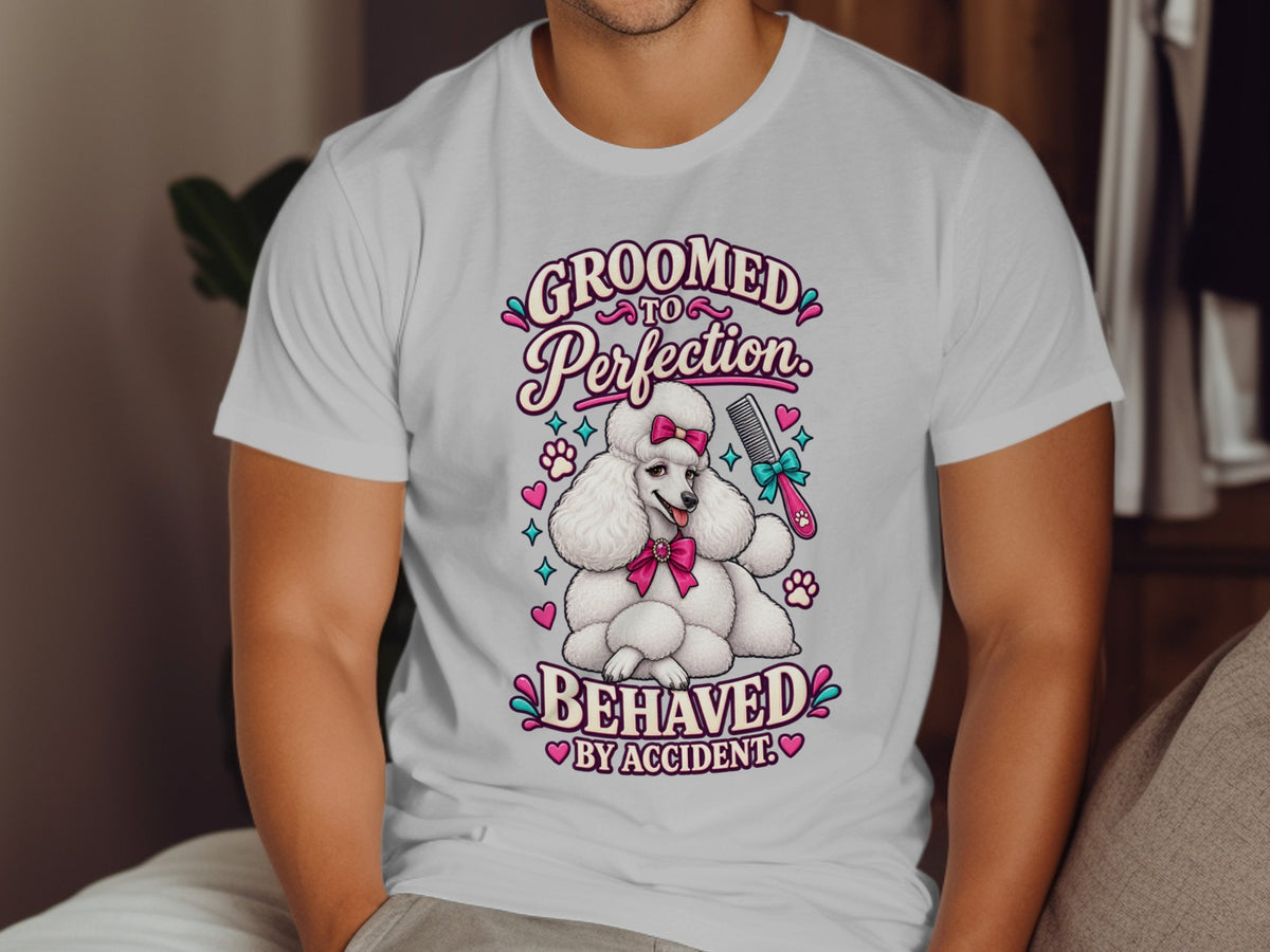 White t-shirt with "GROOMED TO PERFECTION" and a poodle.