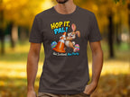 Brown t-shirt with cartoon rabbit holding traffic cone and text "Hop it, Pal! Nae Scotland, Nae Party."