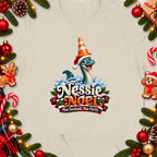 Nessie Noel graphic with a cheerful Loch Ness Monster wearing a Santa hat and cone.