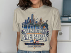 T-shirt graphic with Austin skyline, Scottish and US flags, and "Nae Scotland Nae Party" text.