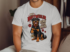 Rottweiler dog with keys and paw prints on a white t-shirt reading "My Rottweiler Runs This House."