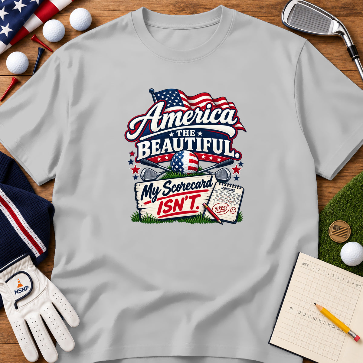 Light gray t-shirt featuring a patriotic golf graphic that says America the Beautiful My Scorecard Isn't.