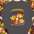 Three cartoon chicks with Scottish hats and bows, beside a traffic cone. Text reads "Cracking Good Party Nae Scotland, Nae Party."