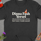 Dark grey t-shirt with "Dinna Fash Yersel" phrase and definition.