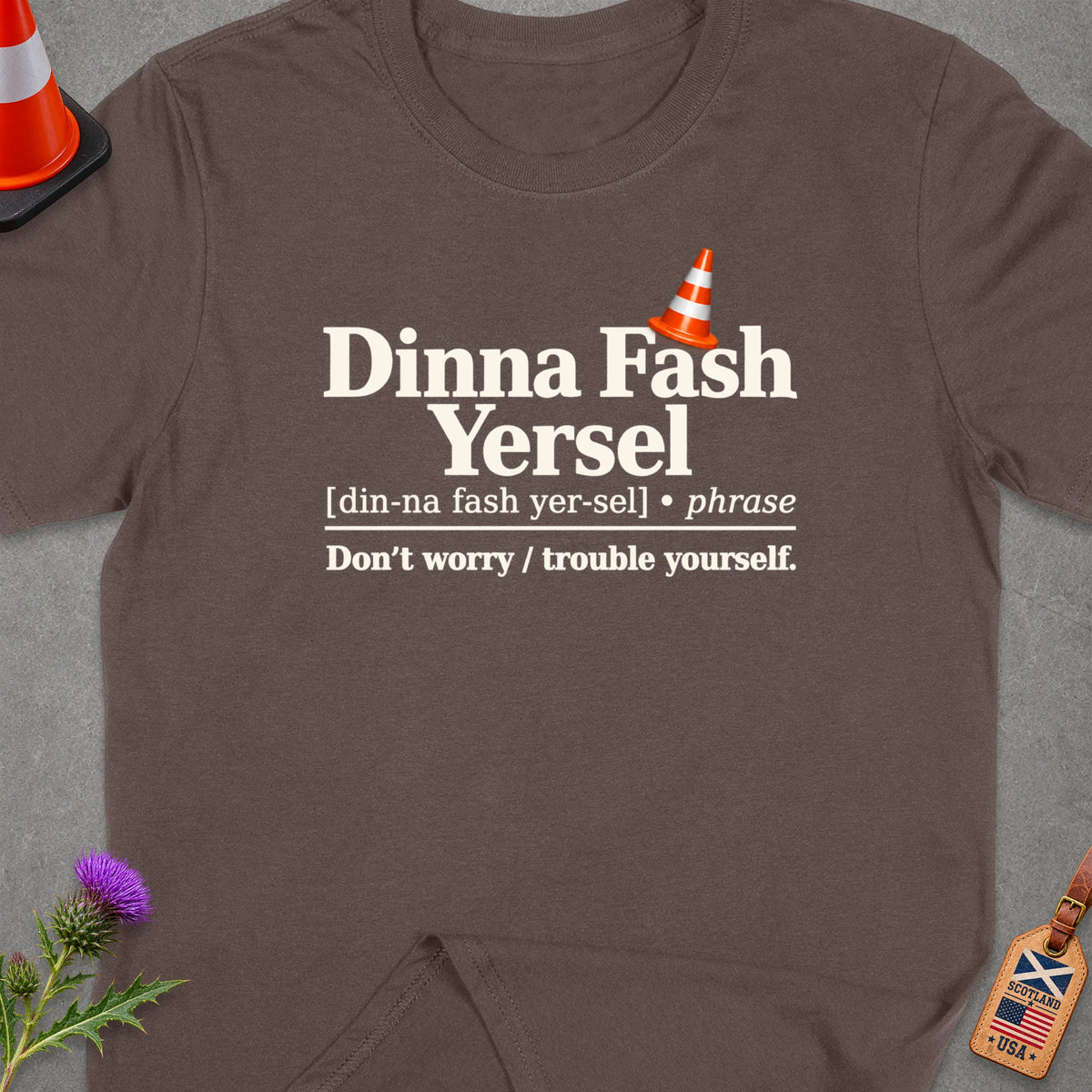 Brown t-shirt with "Dinna Fash Yersel" phrase and definition.