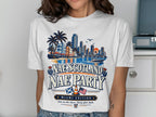 White t-shirt with "Nae Scotland Nae Party Miami Edition" graphic.