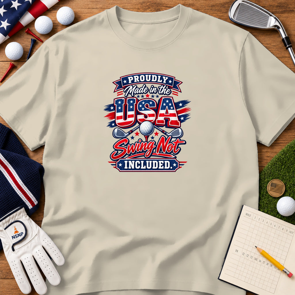 Beige t-shirt featuring a red, white, and blue golf graphic with patriotic text, surrounded by golf accessories.