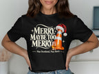 Black t-shirt with "Merry Maybe Too Merry" and a traffic cone wearing a Santa hat.