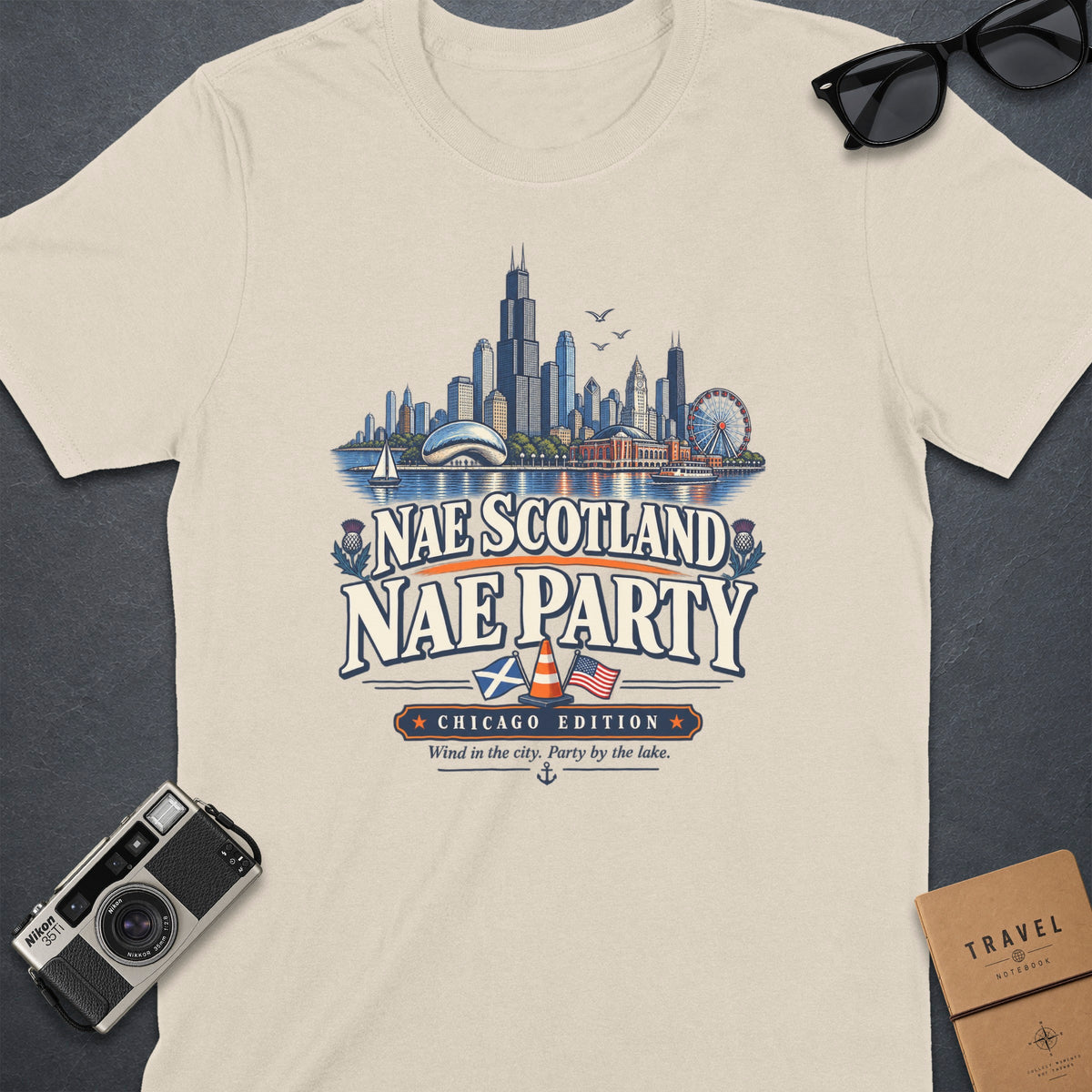 Cream t-shirt with "Nae Scotland Nae Party Chicago Edition" graphic.
