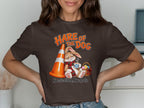 Brown t-shirt with a rabbit, traffic cone, Easter eggs, and text "Hare of the Dog".