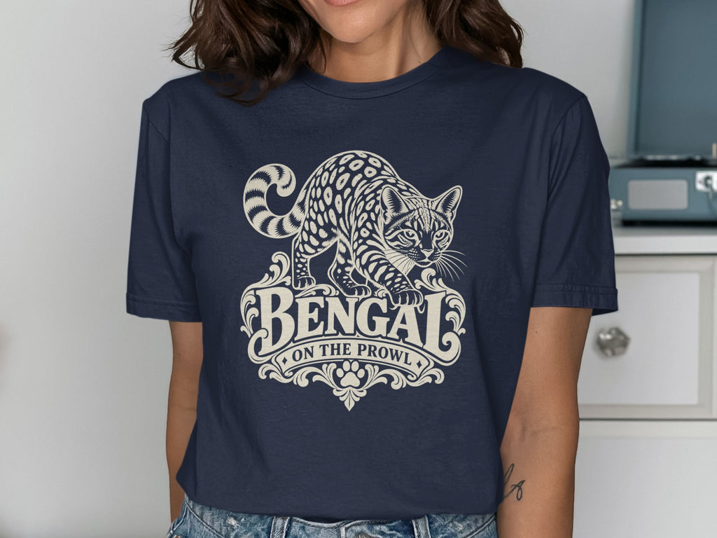 Bengal cat graphic with text "BENGAL ON THE PROWL" on a navy shirt.