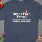 T-shirt with "Dinna Fash Yersel" and its meaning in English, plus flags.