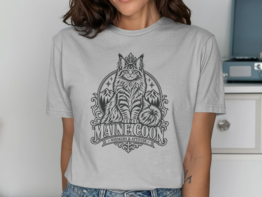 Gray t-shirt featuring a vintage-style Maine Coon cat illustration with mountains and trees.