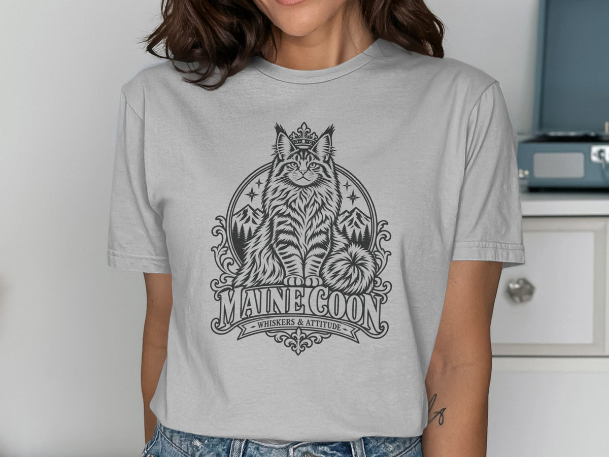 Gray t-shirt featuring a vintage-style Maine Coon cat illustration with mountains and trees.