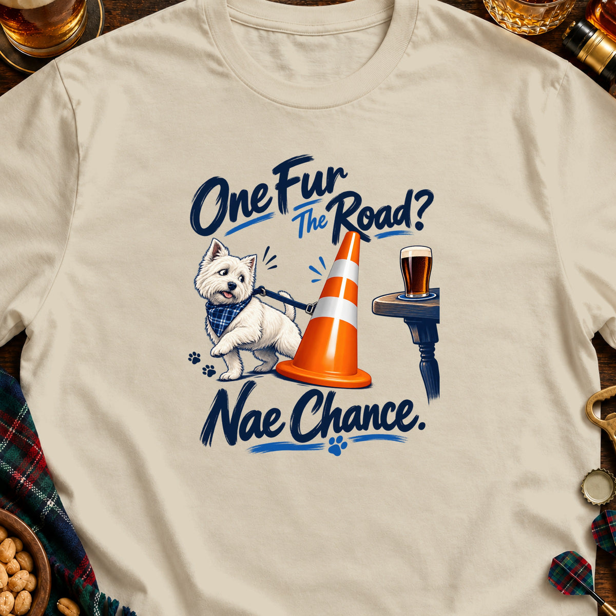 Westie dog next to traffic cone and beer mug with text "One Fur The Road? Nae Chance."