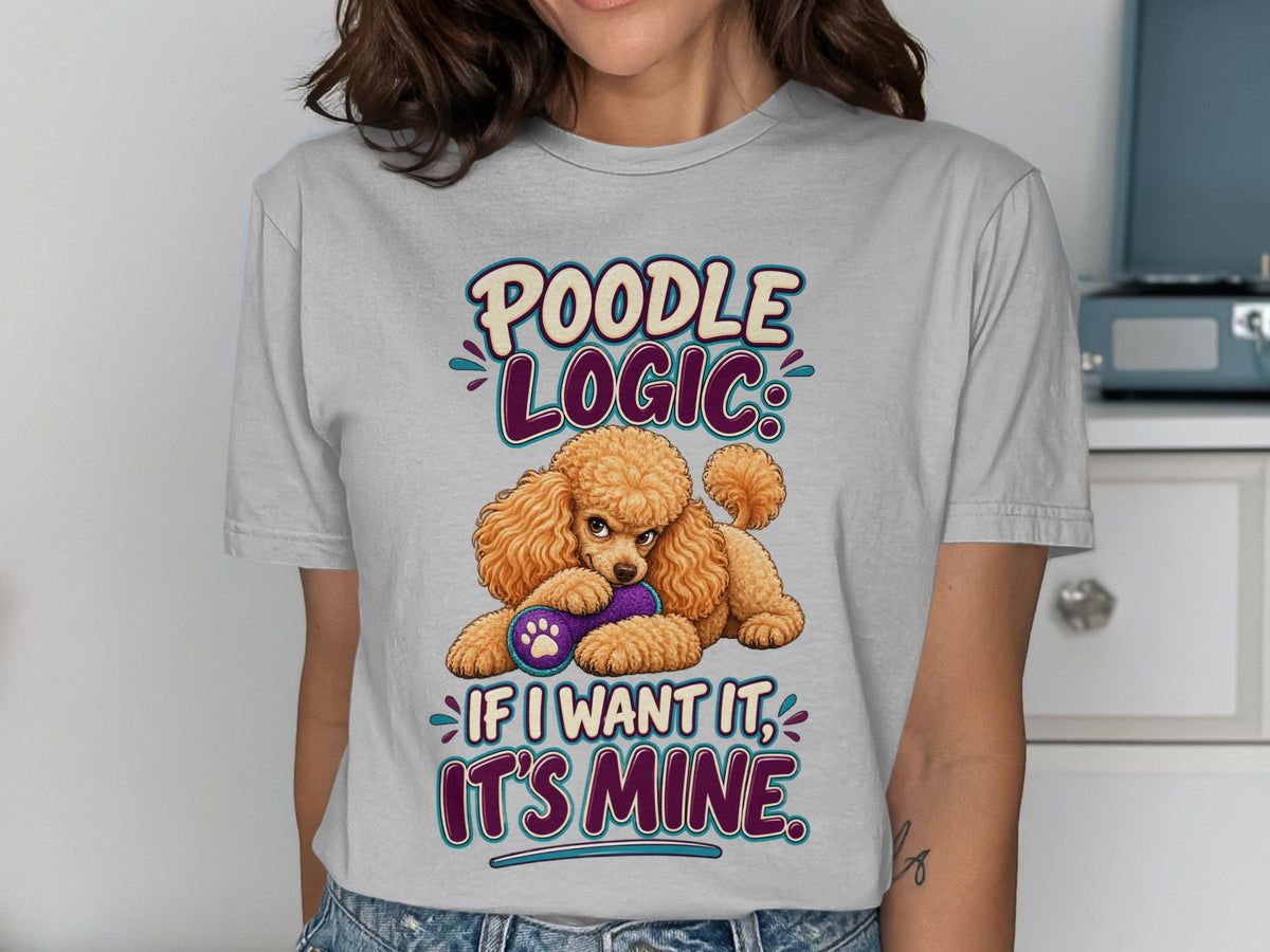 Poodle with toy and text "Poodle Logic: If I want it, it's mine."