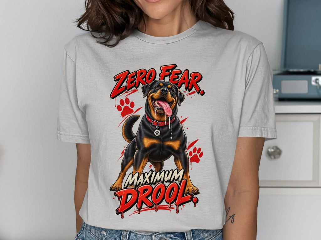 Rottweiler with red text "ZERO FEAR" and "MAXIMUM DROOL" on a t-shirt.