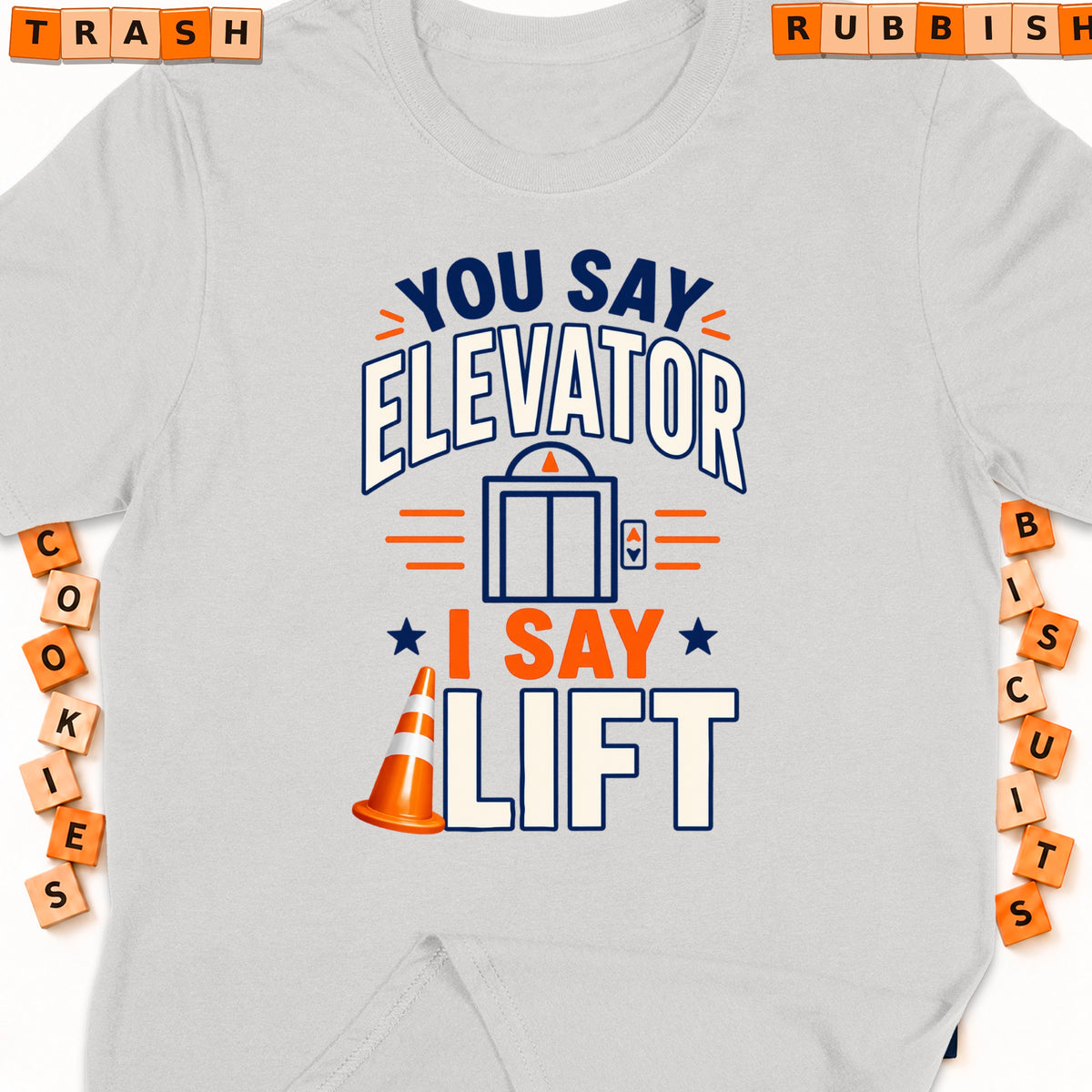 Gray t-shirt with text "You say Elevator, I say Lift" and an elevator graphic.