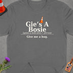 Dark grey t-shirt with "Gie's A Bosie" and "Give me a hug." text.