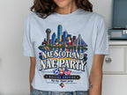 Dallas skyline with "Nae Scotland Nae Party" text and Texas flag.