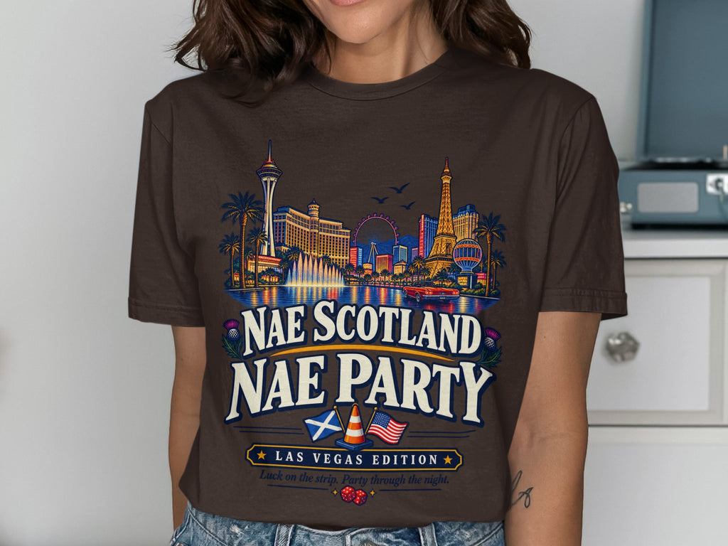 Brown t-shirt with Las Vegas skyline graphic and "Nae Scotland Nae Party" text.