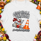 T-shirt graphic with cartoon chick, Easter eggs, and Scottish text "Egg Roll Patrol Nae Scotland Nae Party".