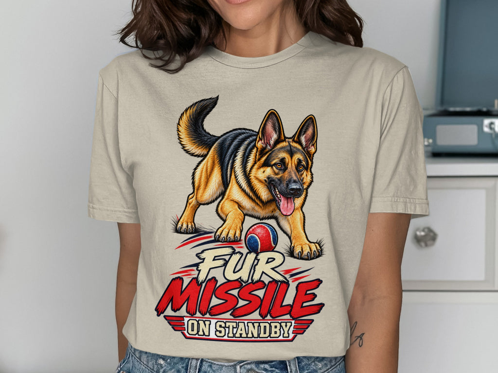 German Shepherd with ball on t-shirt reading "Fur Missile On Standby"