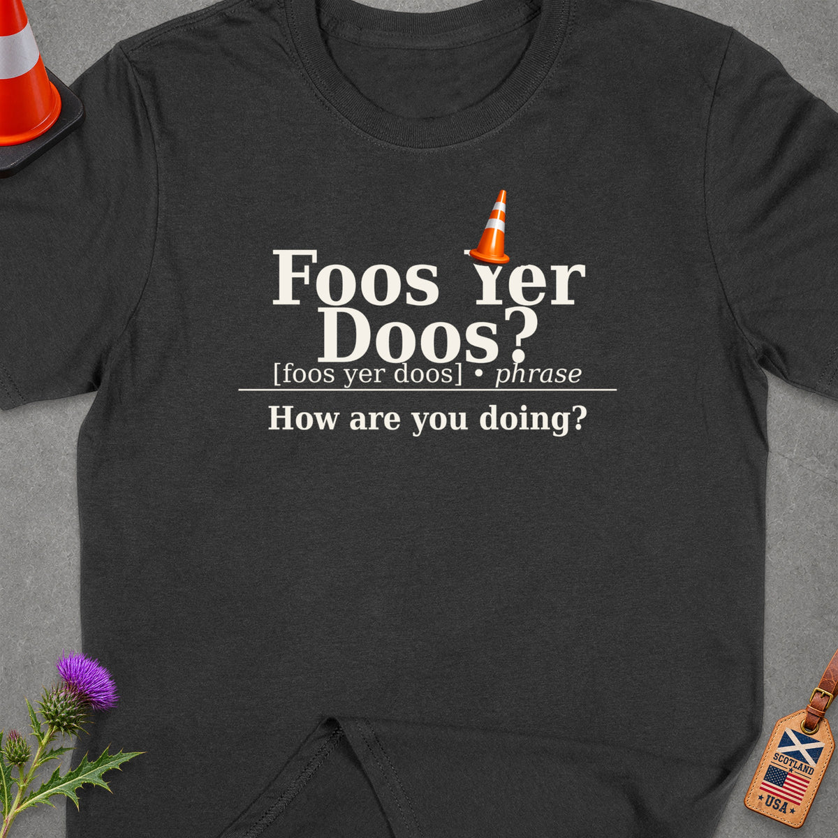 Dark grey t-shirt with "Foos Yer Doos?" definition and Scotland USA tag.