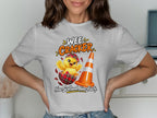 Chick hatching from a plaid egg next to an orange traffic cone with text.