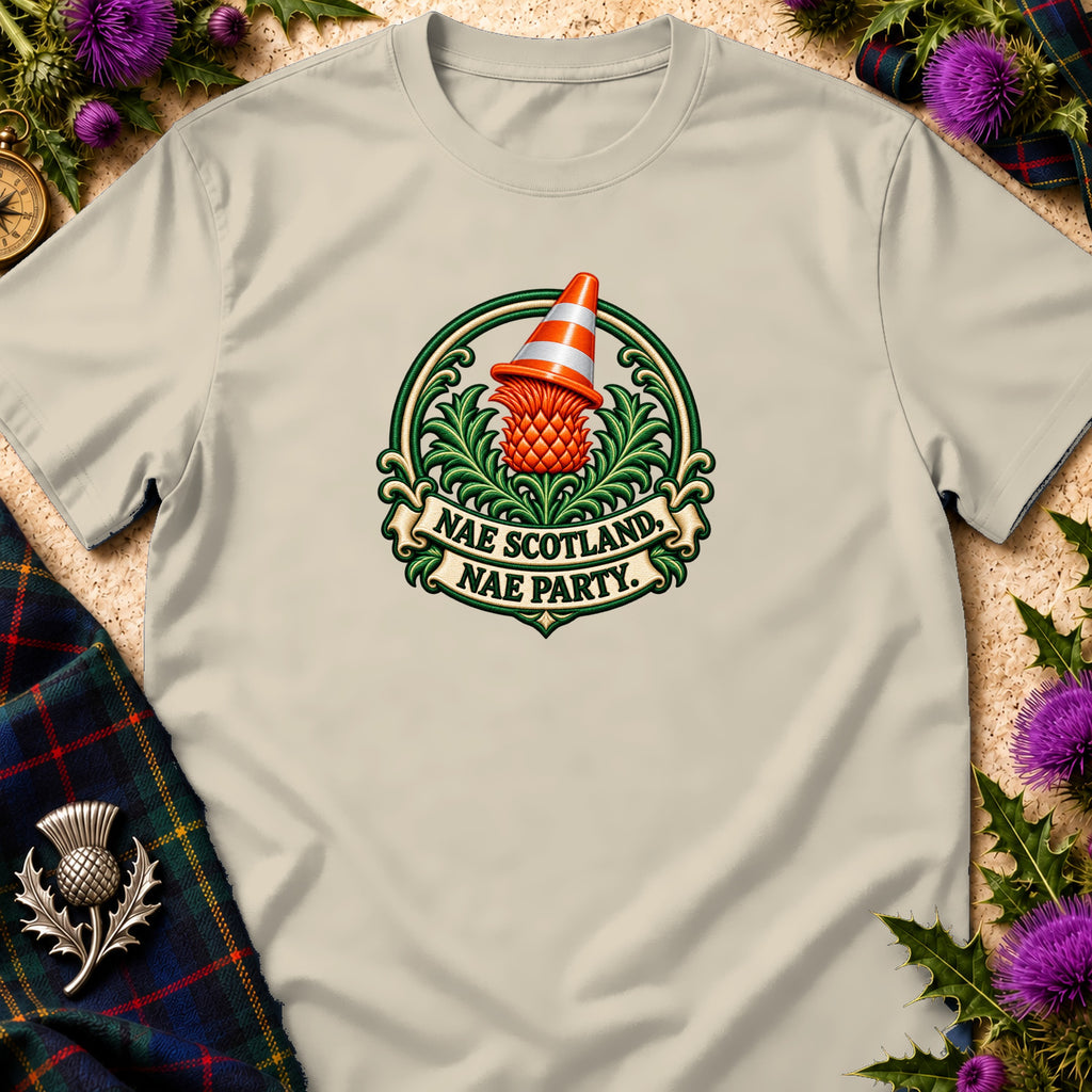 Light beige t-shirt featuring a green and orange graphic with a traffic cone and text reading Nae Scotland, Nae Party.