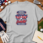 Light gray t-shirt featuring a red, white, and blue golf graphic with USA text on a wooden surface.
