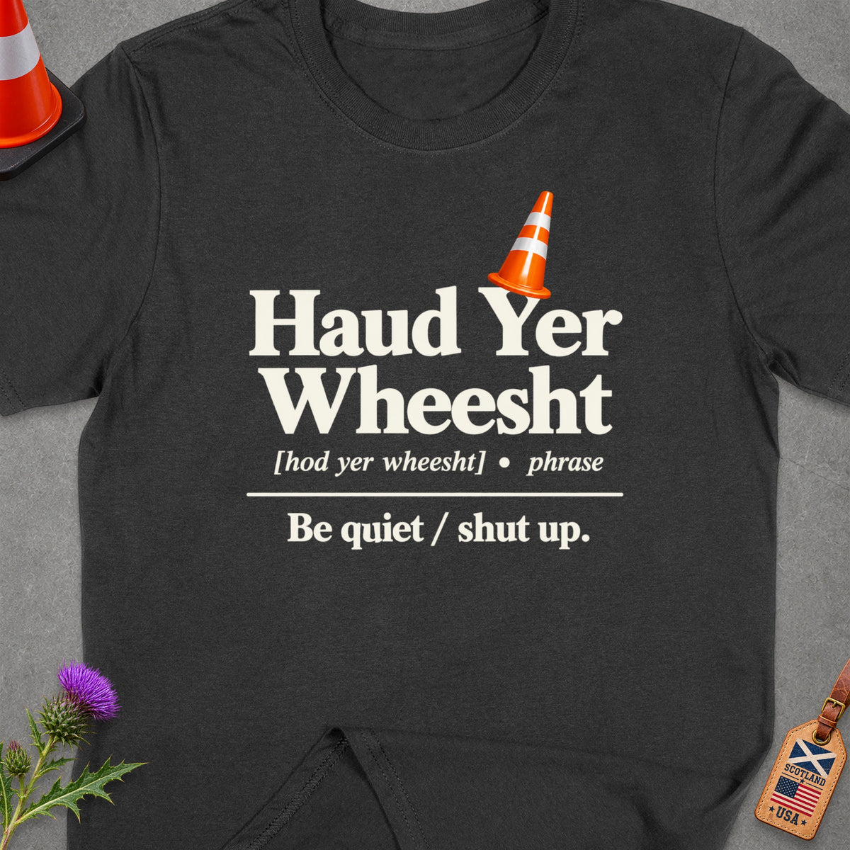 Dark grey t-shirt with "Haud Yer Wheesht" and definition printed in white.