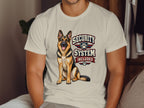 German Shepherd graphic on a cream t-shirt with text "SECURITY SYSTEM INCLUDED".