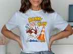 White t-shirt with bunny on the run graphic and Scottish text.