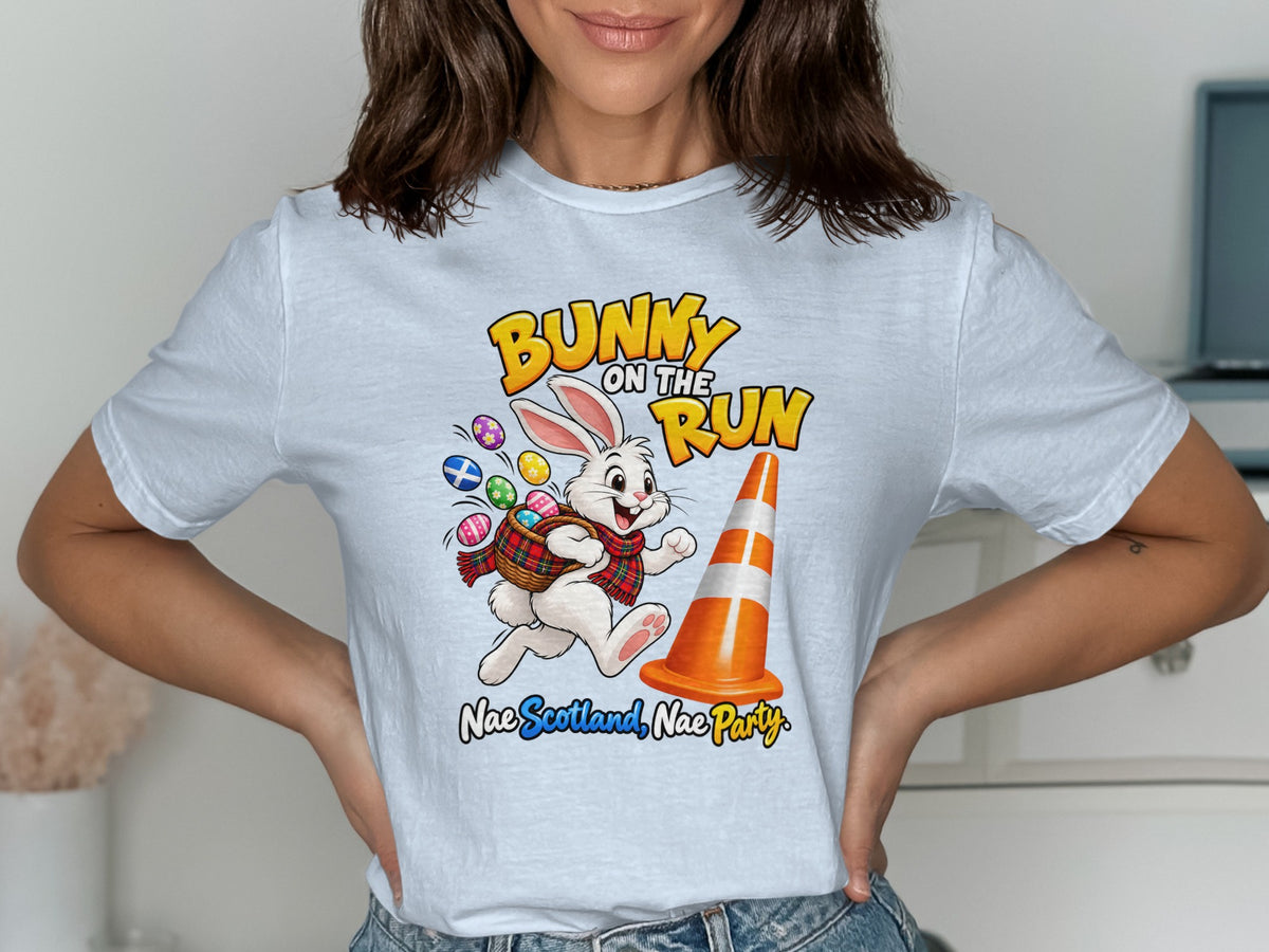 White t-shirt with bunny on the run graphic and Scottish text.