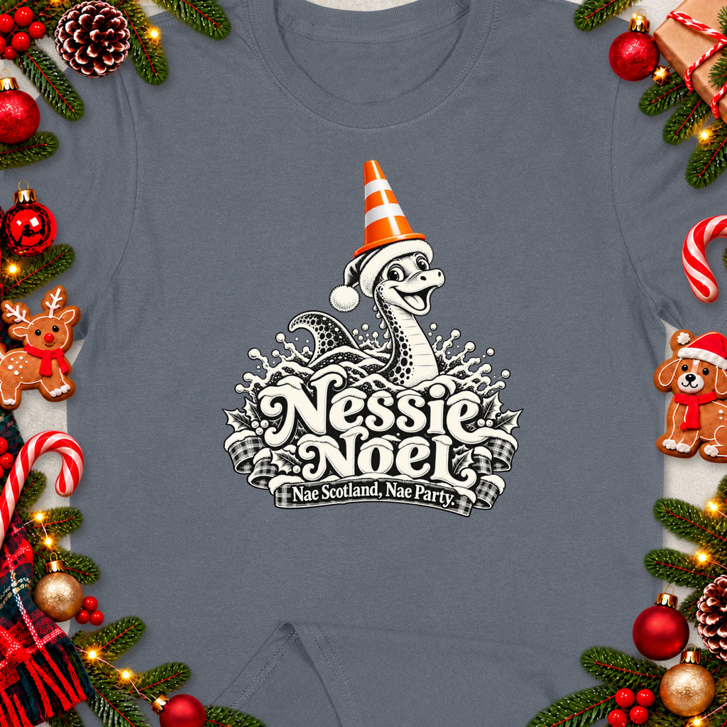 Nessie Noel graphic with text "Nae Scotland, Nae Party." on a grey t-shirt.
