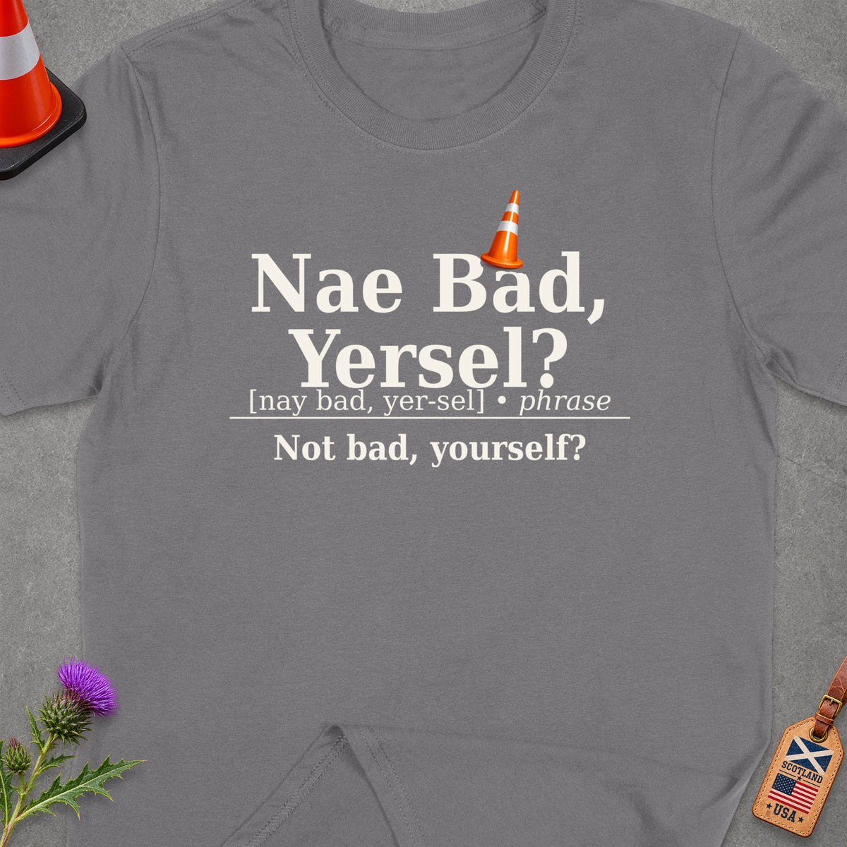 Grey t-shirt with "Nae Bad, Yersel?" text and Scottish/USA flag tag.