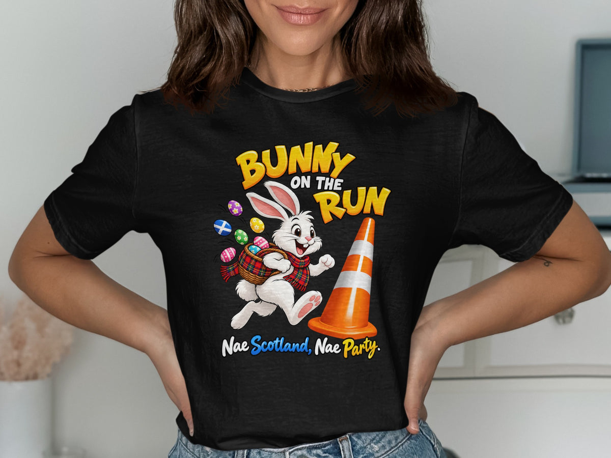 Bunny on the run graphic with Easter eggs, traffic cone, and Scottish text.