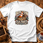 A white t-shirt featuring a humorous graphic with text reading Boston Tea Party Nae Scotland, Nae Party.